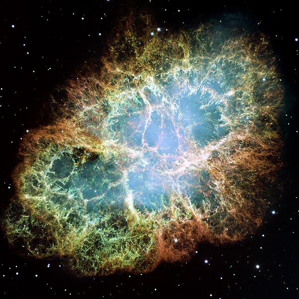 The bluish glow from the central region of the Crab Nebula is due to synchrotron radiation.
